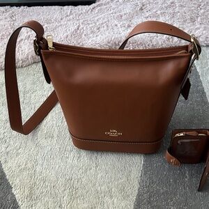 Coach Tan Leather Shoulder Bag. 

Bag is brand new never been used.
